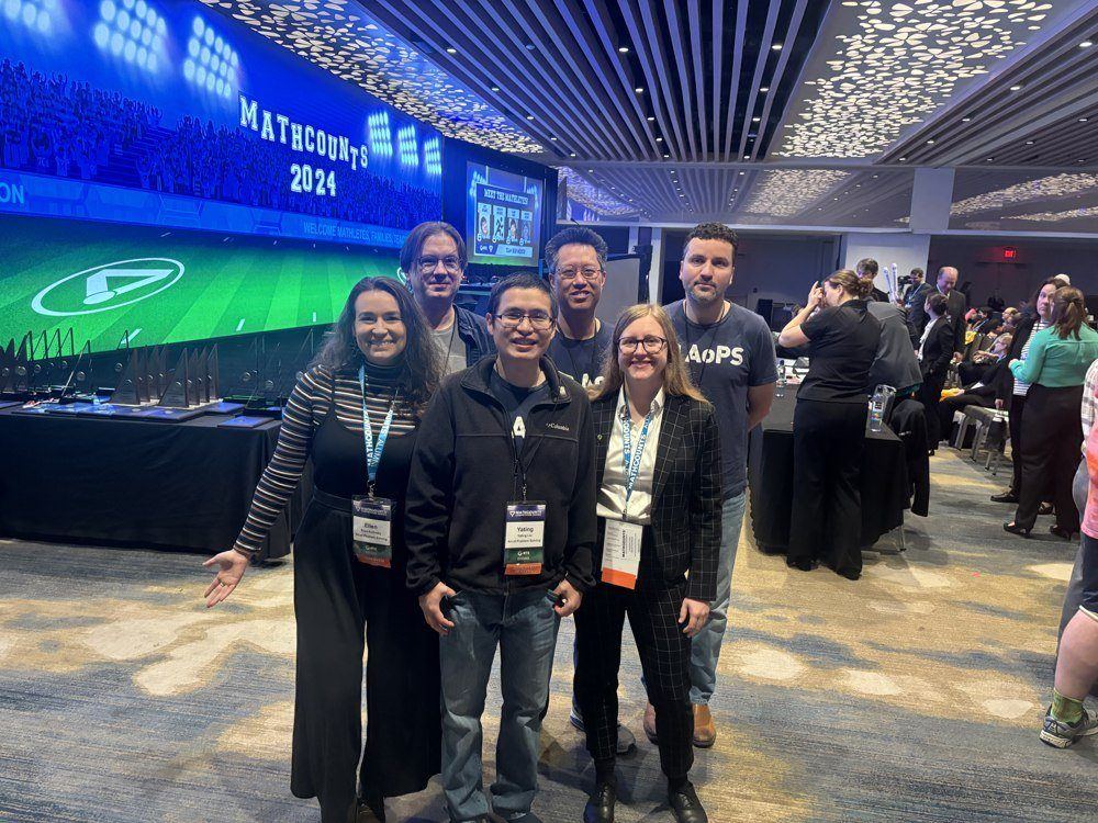 Ellen and colleagues at the AoPS exhibit during the National MathCounts 2024 competition