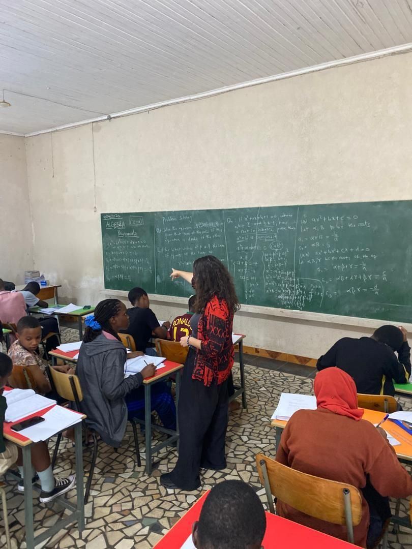 Ellen teaching a live lesson in front of coaches in Kigali, Rwanda, with the Rwandan Olympiad Foundation